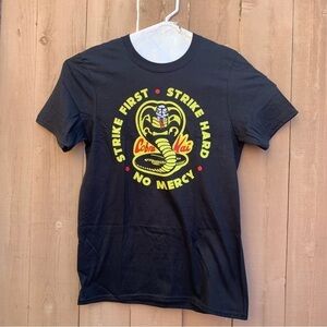 LICENSED Cobra Kai Karate Kid Strike First NO MERCY T-shirt Size S,M,L NEW D69